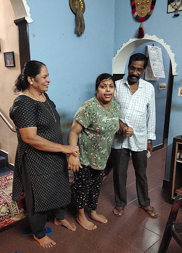 Step by step: Durga, one of the first students at Adarsh, with her parents.