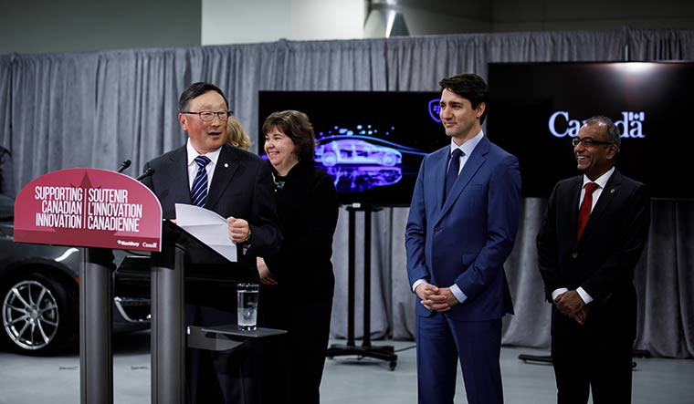 Money talks: BlackBerry CEO John Chen with Canadian Prime Minister Justin Trudeau, who visited the company headquarters in Ontario in February to make an investment announcement.