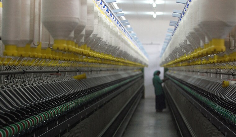 A VIEW OF A MEDIUM SPINNING MILL AND ITS EMPLOYEES AT SULUR NEAR COIMBATORE , TAMIL NADU . NOVEMBER 2008  PHOTO BY BHANU PRAKASH CHANDRA