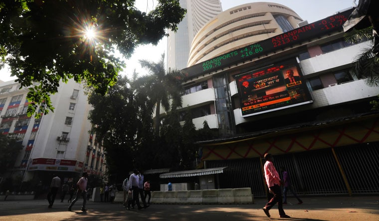 Brisk business; The BSE Sensex crossed the 50,000 mark for the first time on January 21. As the markets have rallied, Indian investors, too, have taken to buying stocks in a big way | AP