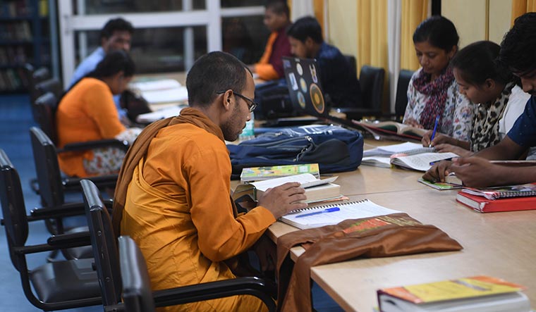 Students in the Nava Nalanda Mahavihara library.