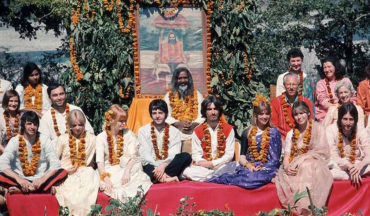 On stranger shores: The Beatles and their wives at Maharishi Mahesh Yogi’s ashram in Rishikesh. The group includes Ringo Starr, Maureen Starkey, Jane Asher, Paul McCartney, George Harrison, Pattie Boyd, Cynthia Lennon, John Lennon, The Beatles’ roadie Mal Evans, Prudence Farrow, Jenny Boyd and Beach Boy Mike Love | Paul Saltzman On stranger shores: The Beatles and their wives at Maharishi Mahesh Yogi’s ashram in Rishikesh. The group includes Ringo Starr, Maureen Starkey, Jane Asher, Paul McCartney, George Harrison, Pattie Boyd, Cynthia Lennon, John Lennon, The Beatles’ roadie Mal Evans, Prudence Farrow, Jenny Boyd and Beach Boy Mike Love | Paul Saltzman