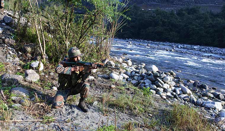 Arm, aim: A combatant of Rajputana Rifles near the LAC | R. Prasannan