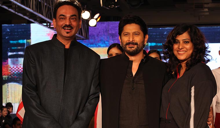 Trending trio: Actor Arshad Warsi (middle) walks the ramp for Rodricks and designer Schulen Fernandes.