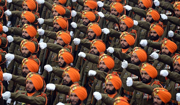 Marching ahead: A Sikh Light Infantry contingent during Republic Day parade at Rajpath in New Delhi | AFP