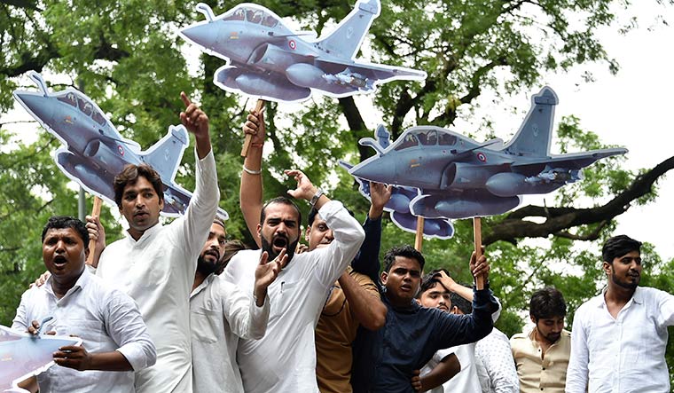 Focused attack: Congress workers protest the Rafale deal in Delhi. Rahul Gandhi has been raising the alleged corruption in the deal | Aayush Goel