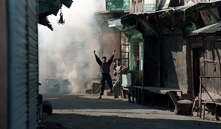 Burning resistance: Protesters braving tear-gas shells fired by security agencies in curfew-bound Srinagar in October 1993 | Getty Images