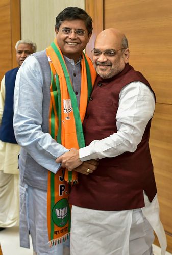 Crossover candidate: Baijayant Panda with BJP president Amit Shah. A former BJD leader, Panda is contesting from Kendrapara Lok Sabha constituency | PTI