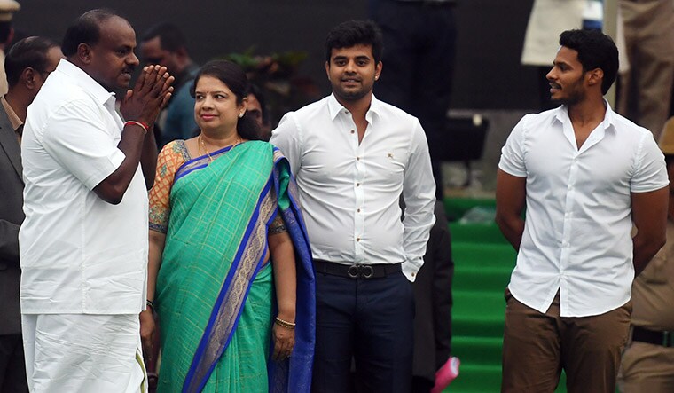 Family show: (From left) Karnataka Chief Minister Kumaraswamy with wife Anitha, nephew Prajwal Revanna and son Nikhil at his swearing-in ceremony | Bhanu Prakash Chandra