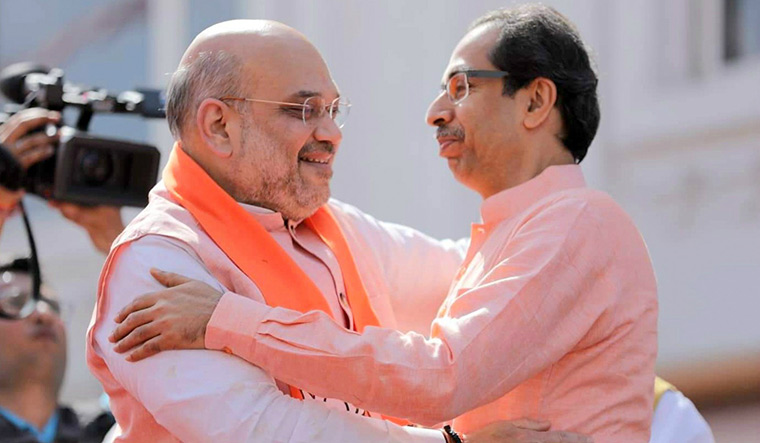 United they stand: Shah with Shiv Sena chief Uddhav Thackeray. The BJP and the Sena came together ahead of the elections resolving a bitter feud.