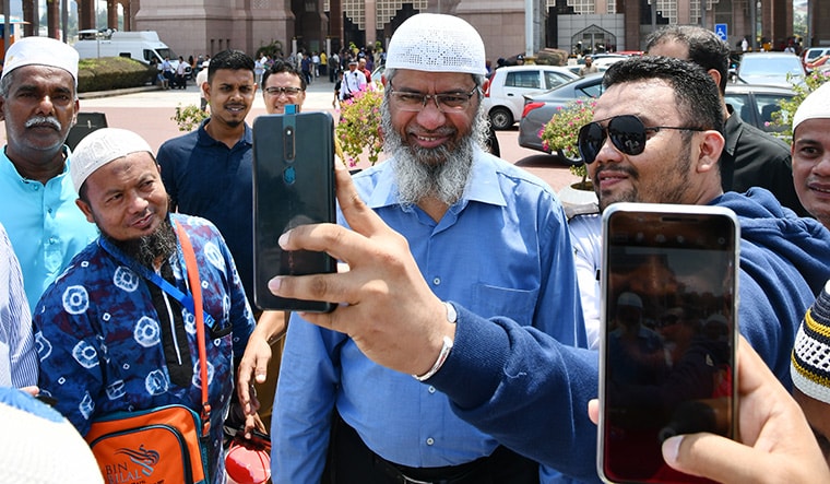 Leader of the faithful: Zakir Naik outside the Putra Mosque at Putrajaya, Malaysia.
