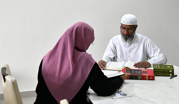 Enduring bond: Farhat and Zakir at their home in Malaysia.