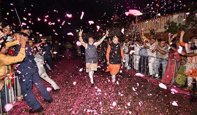 Power walk: Prime Minister Narendra Modi and BJP president Amit Shah arrive at the party headquarters in Delhi | PTI