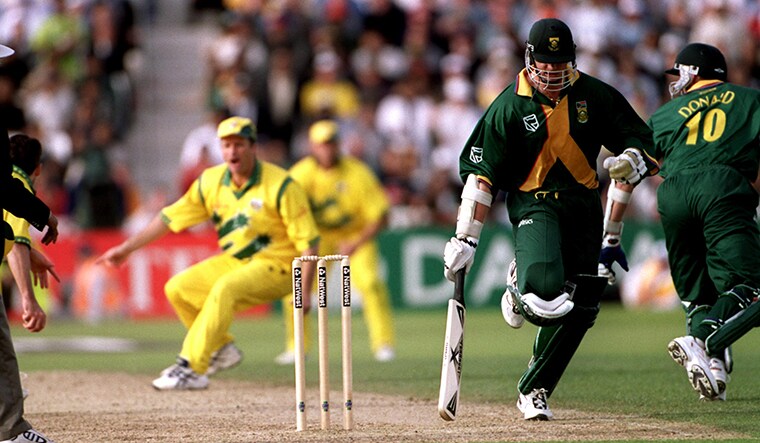 South Africa's Allan Donald (r) sets off for the one run needed to win the match as teammate Lance Klusener (l) passes him at the crease. Donald failed to complete the run and the match finished in a tie, securing Australia's place in the final due to their higher finish in the Super Six section of the tournament  (Photo by Michael Steele/EMPICS via Getty Images)