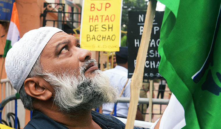 Solidarity sans borders: Congress workers in West Bengal protesting the NRC outside Assam House in Kolkata.