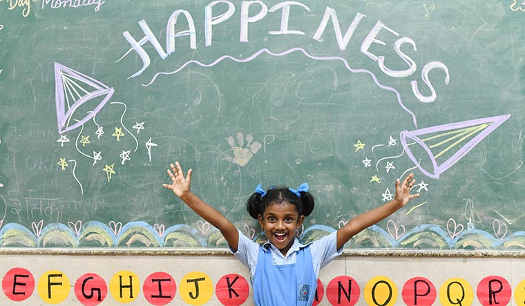 Learn, laugh: A student at a happiness class in Sarvodaya Vidyalaya, Delhi | Sanjay Ahlawat