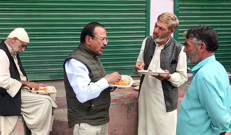 Building bridges: National Security Adviser Ajit Doval interacting with locals at Shopian | PTI