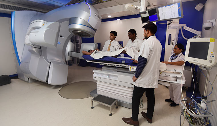 System support: Dr Kaustav Talapatra, head of radiation oncology, Kokilaben Dhirubhai Ambani Hospital, treats a patient using the EDGE radiosurgery system | Abhijit Bhatlekar