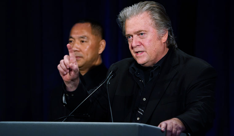 Spinning a Tale?: Former Trump chief strategist Steve Bannon with Chinese billionaire Guo Wengui, a Communist Party critic, at a newsconference in New York in November 2018. Guo is close to activist Lude, who aired Yan's views on his YouTube channel | REUTERS