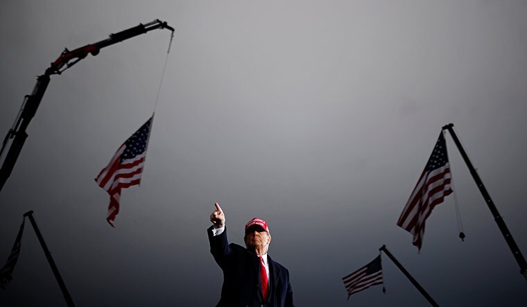 Second time is a charm: Donald Trump at a campaign rally at Muskegon County Airport in Michigan | Reuters