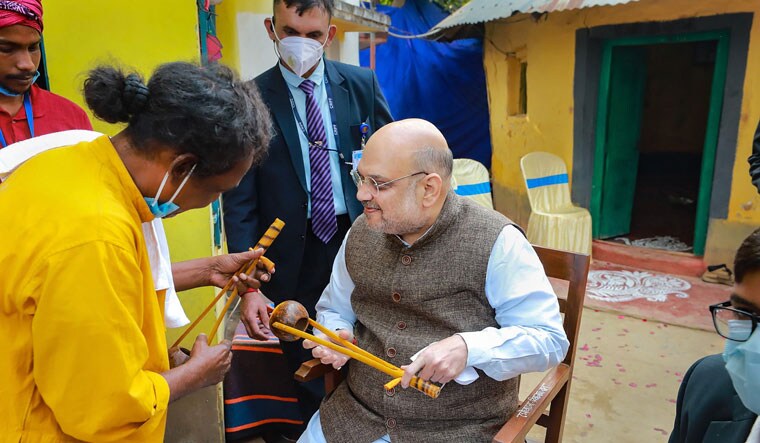 Soft target: Amit Shah visiting the house of Baul singer Basudeb Das in Birbhum | PTI