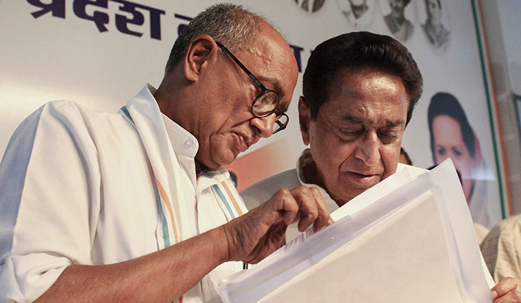 Old guard: Digvijaya Singh (left) and Kamal Nath apparently convinced Sonia Gandhi that Scindia’s demands were disproportionate to his achievements | PTI