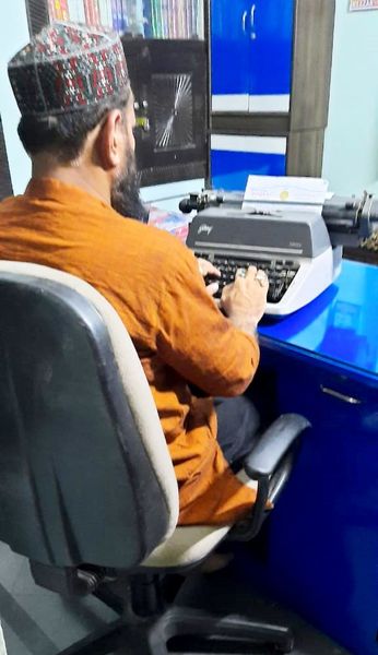 Key keepsake: Wajeed Haseeb’s elder son Qazi Hamed with his typewriter 
