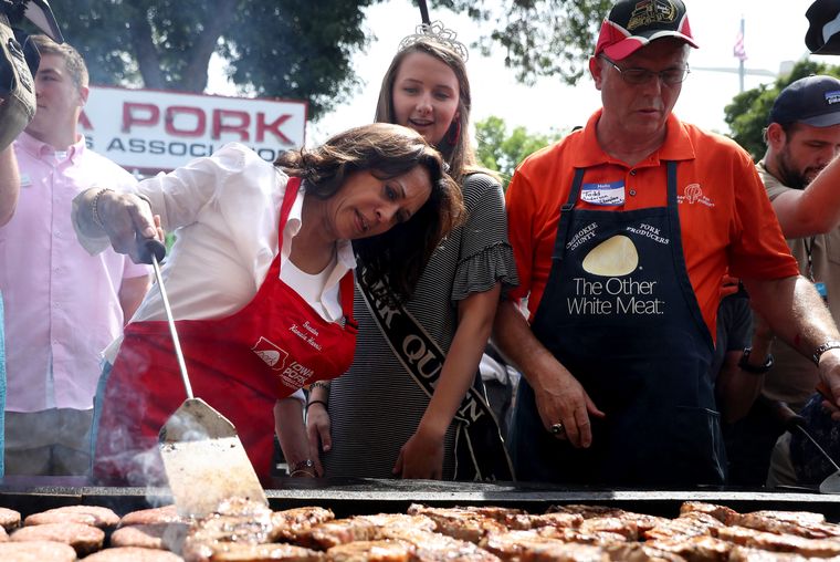 Flipping the narrative: Kamala cooks burgers at the Iowa State Fair in August 2019. On most Sundays Kamala prepares the family dinner | Getty Images