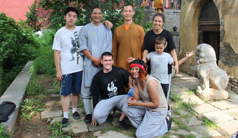 Medha and fellow students with actor Jason Scott Lee (standing second from left), when he visited Shaolin temple 