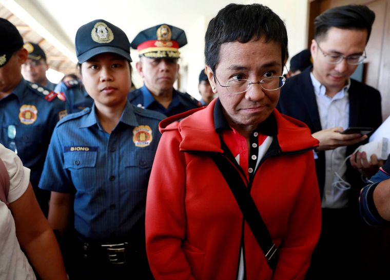 Courting trouble: Ressa after posting bail in a trial court in Pasig City, the Philippines; she has had 10 arrest warrants in less than two years | Reuters