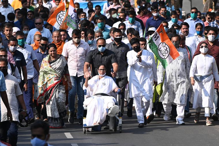 Holding on: Chief Minister Mamata Banerjee at a rally in Kolkata | Salil Bera
