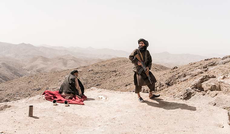 Tough terrain: A fighter of a Taliban faction.