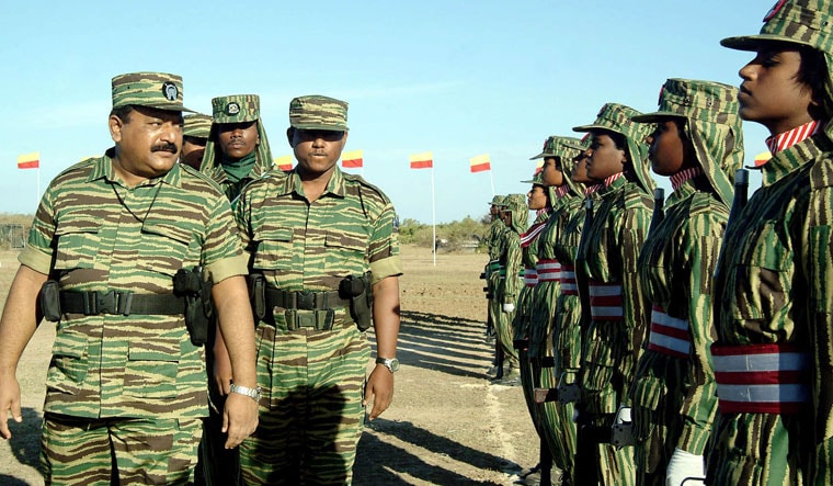 Fatal lapse: LTTE leader V. Prabhakaran with his women fighters. Rajiv Gandhi’s advisers had not taken the true measure of Prabhakaran | AFP