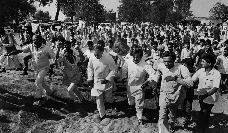 Man of the masses: Rajiv Gandhi with his supporters during a visit to the backward villages in his Amethi Lok Sabha constituency | Getty Images