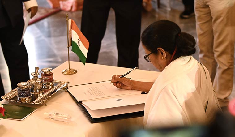 Game, set, match: Mamata Banerjee during her oath-taking ceremony.