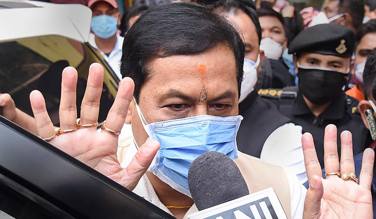 That winning feeling: Assam Chief Minister Sarbananda Sonowal speaks to the media after the BJP's victory | PTI