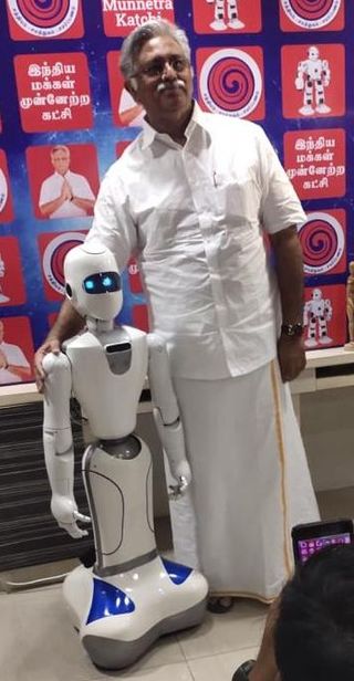  The IMMK, a political party in Tamil Nadu, had unveiled a robot as its symbol in the run-up to the assembly polls.  Party president Ra Arjunamurthy seen above with a Doozy humanoid. 