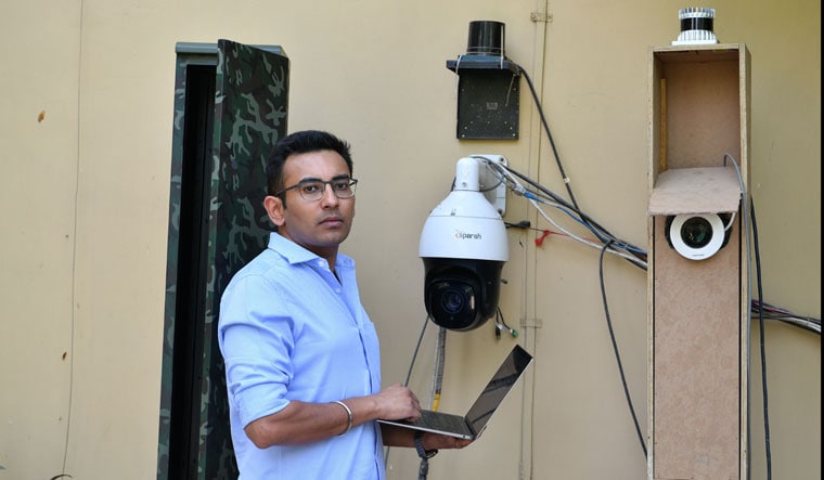 Eye on the enemy: Tushar Chhabra, CEO and founder, Cron AI, seen with some of his gadgets | Arvind Jain