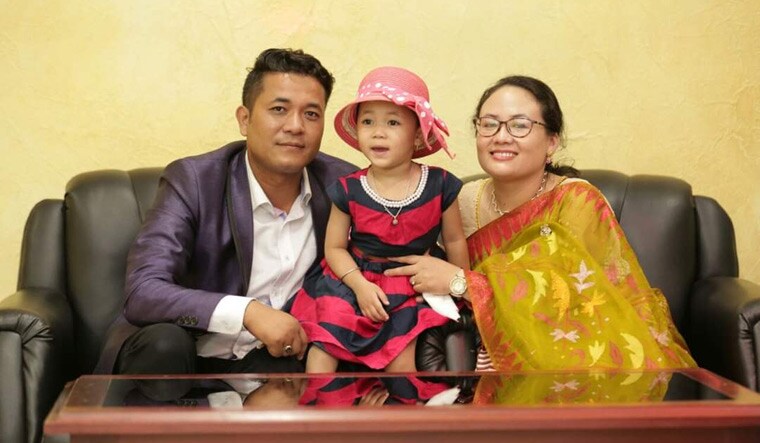 In happier times: Kishorechandra Wangkhem with his family