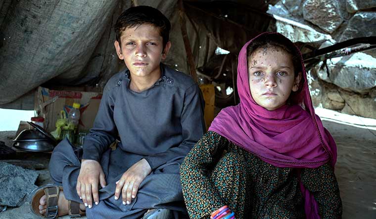 Shattered lives: Children at a refugee camp in laghman province.