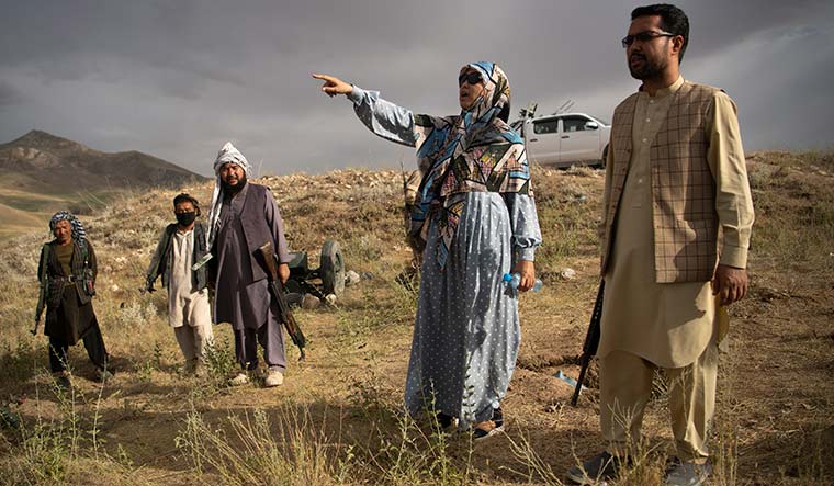 Fighting for life: Salima Mazari and husband  with members of the resistance forces in Charkint  in Balkh province | Massoud Hossaini