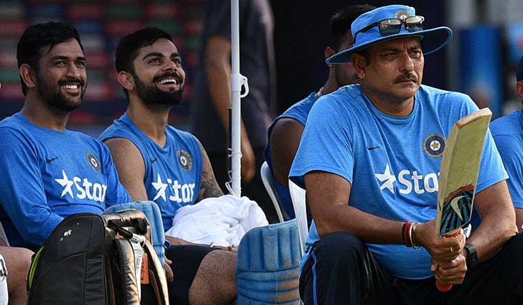 Allies, advisers: Kohli named and thanked M.S. Dhoni (left) and Ravi Shastri in his note posted on social media announcing his resignation | Salil Bera