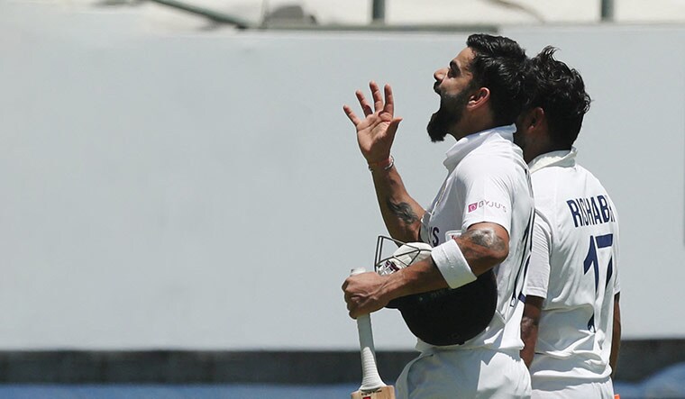 Determined, defiant: Kohli walks off at lunch with Pant during the third Test against South Africa in Capetown on January 13. A defining feature of his captaincy was aggressive decisions in team selections | Reuters