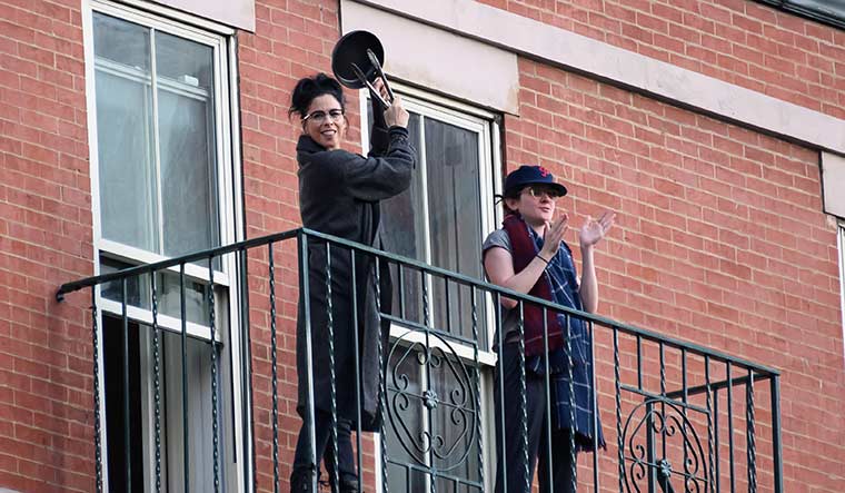 Cheering on the champions: Comedian Sarah Silverman (left) applauds to show her gratitude to frontline workers during the pandemic in 2020 | Getty Images