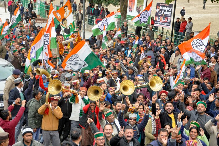 Winning moment: Congress workers celebrating  the party’s victory in the Himachal assembly polls | PTI
