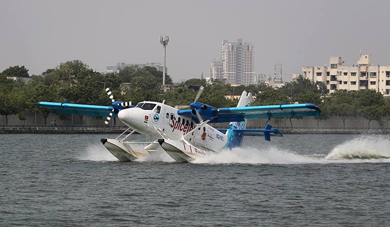 Making a splash: A seaplane carrying Prime Minister Narendra Modi lands in Ahmedabad | AP