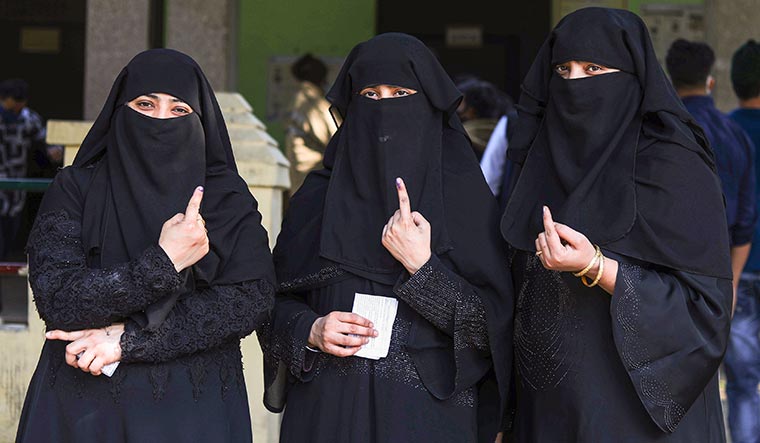 Making a mark: Muslim women after casting their votes in the first phase of the polls | Getty Images