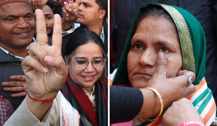 In her hands: Asha Singh, mother of the Unnao rape victim and (left) activist Sadaf Jafar | Pawan Kumar