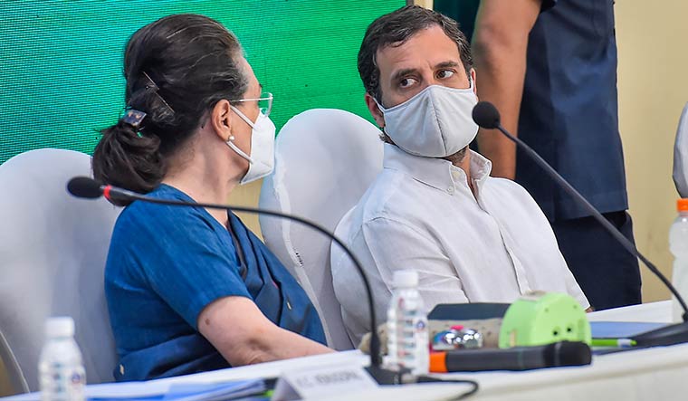 Looking lost: Congress president Sonia Gandhi with Rahul at the Congress Working Committee meeting in New Delhi | PTI (digitally altered)