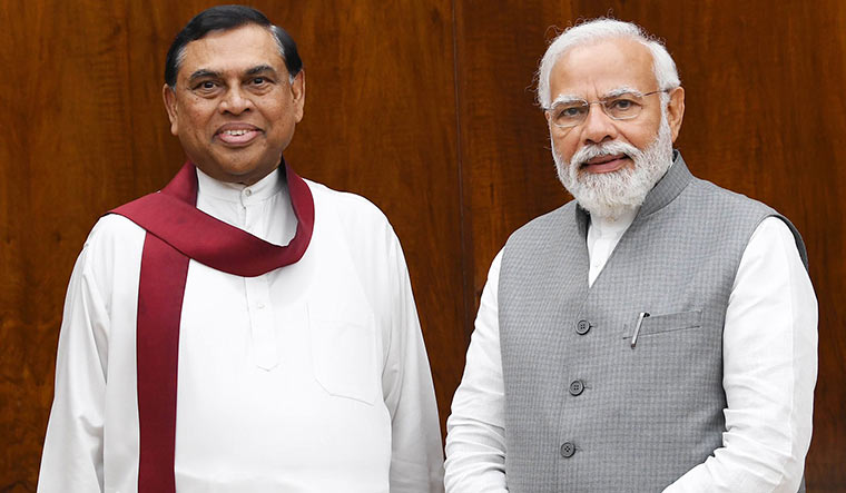 Friend request: Sri Lankan Finance Minister Basil Rajapaksa with Prime Minister Narendra Modi in Delhi | PTI